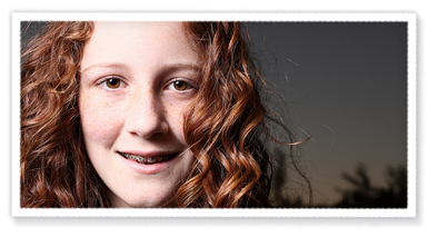 stock photo of a teen girl with braces