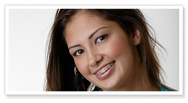stock photo of a teen girl with braces