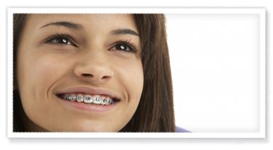 stock photo of a teen girl with braces