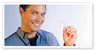 photo of man with invisalign appliance