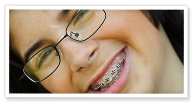 stock photo of a teen boy with braces
